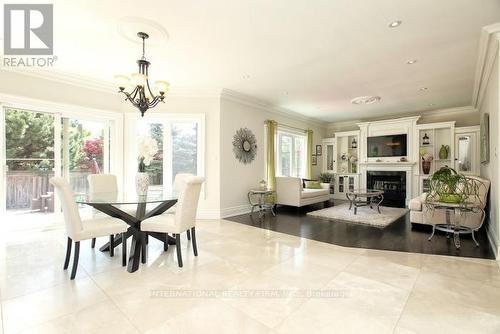 7 Elderwood Drive, Richmond Hill, ON - Indoor Photo Showing Dining Room With Fireplace