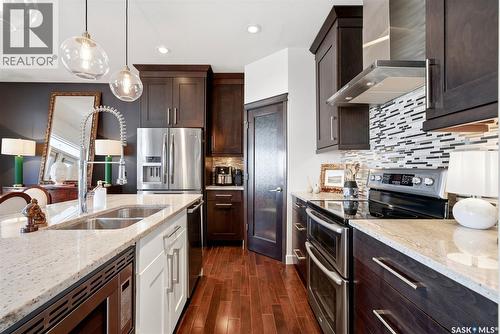4757 Skinner Crescent, Regina, SK - Indoor Photo Showing Kitchen With Double Sink With Upgraded Kitchen