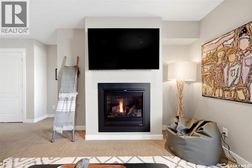 4757 Skinner Crescent, Regina, SK - Indoor Photo Showing Living Room With Fireplace