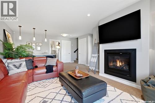 4757 Skinner Crescent, Regina, SK - Indoor Photo Showing Living Room With Fireplace