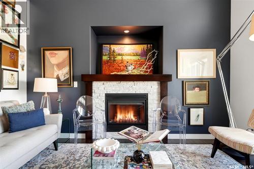 4757 Skinner Crescent, Regina, SK - Indoor Photo Showing Living Room With Fireplace