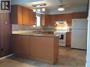 7487 Highland Drive, Fort Nelson, BC  - Indoor Photo Showing Kitchen 