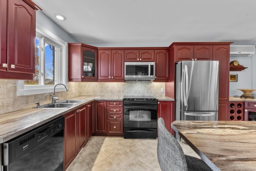 Cuisine - 889 Rue Des Érables, Saint-Eustache, QC - Indoor Photo Showing Kitchen With Double Sink