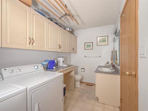 173038 60 (Kola) Road N, Virden, MB - Indoor Photo Showing Laundry Room