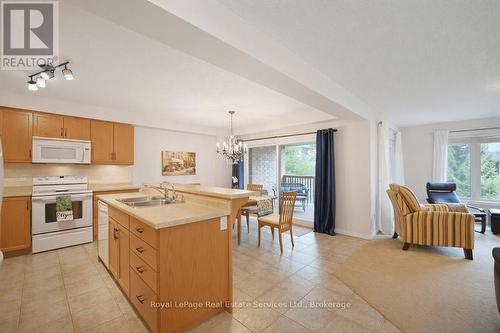 11 - 255 Summerfield Drive, Guelph (Pineridge/Westminster Woods), ON - Indoor Photo Showing Kitchen With Double Sink