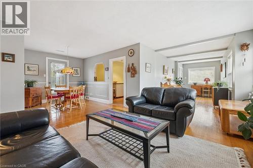 The property features hardwood floors and light gray walls throughout - 155 Hungerford Road, Cambridge, ON - Indoor Photo Showing Living Room