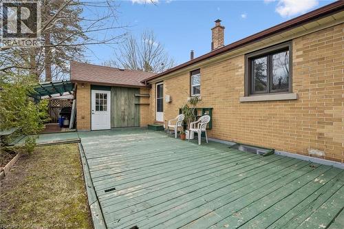 The property features an expansive outdoor deck, offering ample space for recreation - 155 Hungerford Road, Cambridge, ON - Outdoor With Exterior