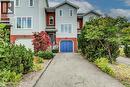 View of front of home with driveway, brick siding, and an attached garage - 633 Grange Crescent, Waterloo, ON  - Outdoor 