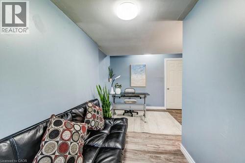Office space featuring wood finished floors and baseboards - 633 Grange Crescent, Waterloo, ON - Indoor Photo Showing Other Room