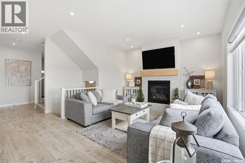 342 Stilling Manor, Saskatoon, SK - Indoor Photo Showing Living Room With Fireplace
