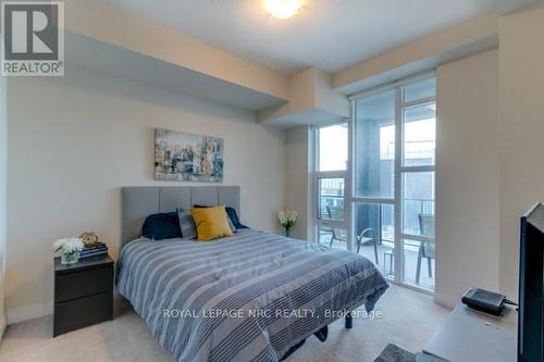 207 - 10 Concord Place, Grimsby (Grimsby Beach), ON - Indoor Photo Showing Bedroom