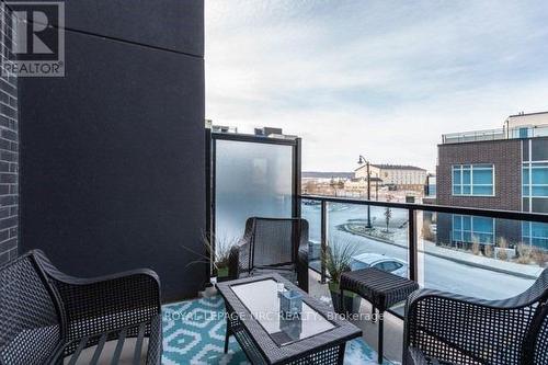 207 - 10 Concord Place, Grimsby (Grimsby Beach), ON - Outdoor With Balcony