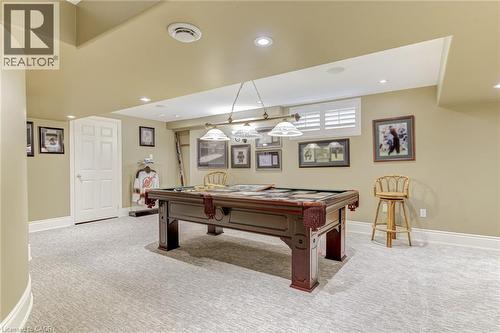 Recreation room featuring a pool table, carpeted flooring, recessed lighting, and a window with white shutters - 4278 Clubview Drive, Burlington, ON - Indoor Photo Showing Other Room