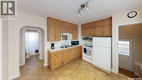 2711 Montreal Crescent, Regina, SK - Indoor Photo Showing Kitchen With Double Sink