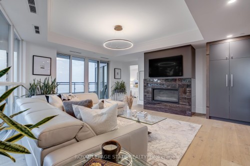 308-2060 Lakeshore Road, Burlington, ON - Indoor Photo Showing Living Room With Fireplace
