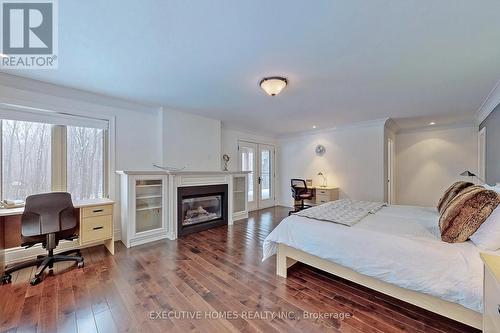 7651 Milburough Line, Milton, ON - Indoor Photo Showing Bedroom With Fireplace
