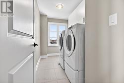 3rd Floor Laundry with laundry tub & window - 