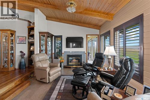 70 Cactus Drive, Saskatchewan Landing, SK - Indoor Photo Showing Living Room With Fireplace