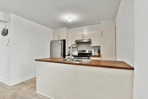 Cuisine - 312 3E Avenue, Crabtree, QC - Indoor Photo Showing Kitchen With Double Sink