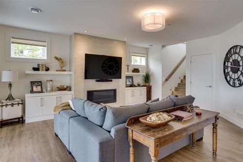 3303 Water Birch Circle, Kelowna, BC - Indoor Photo Showing Living Room With Fireplace