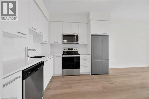 Extended height cabinets, s.s. appliances - 385 Winston Road Unit# 1607, Grimsby, ON - Indoor Photo Showing Kitchen With Stainless Steel Kitchen With Upgraded Kitchen