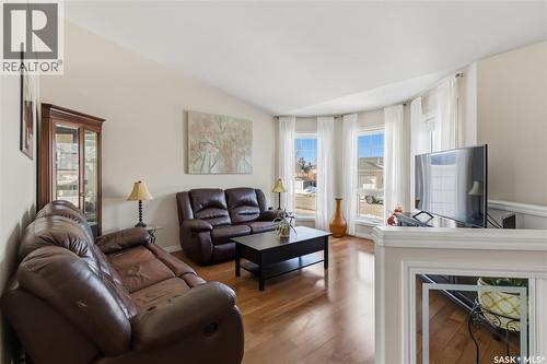 414 Adaskin Cove, Saskatoon, SK - Indoor Photo Showing Living Room With Fireplace