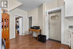Main floor bedroom located just off the kitchen - 