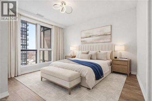 This room features large windows with curtains and light-toned walls - 104 Garment Street Unit# 1206, Kitchener, ON - Indoor Photo Showing Bedroom