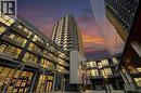 Modern high-rise building featuring extensive glass facades and individual balconies - 104 Garment Street Unit# 1206, Kitchener, ON  -  