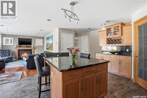 7270 Maple Way, Regina, SK - Indoor With Fireplace