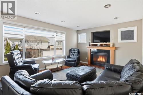 7270 Maple Way, Regina, SK - Indoor Photo Showing Living Room With Fireplace