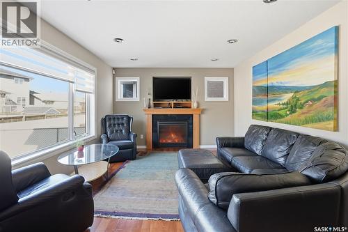 7270 Maple Way, Regina, SK - Indoor Photo Showing Living Room With Fireplace