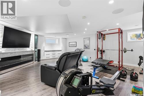 7270 Maple Way, Regina, SK - Indoor Photo Showing Other Room With Fireplace