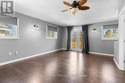 DOORS LEADING TO REAR PRIMARY SUITE DECK - 