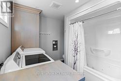 UPDATED ENSUITE WITH LAUNDRY - 