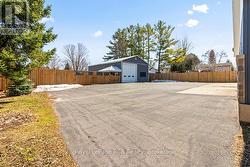 PAVED DRIVEWAY WITH AMPLE PARKING SPACE - 