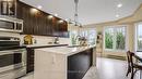 2D - 4 Columbus Avenue, Ottawa, ON  - Indoor Photo Showing Kitchen With Stainless Steel Kitchen With Double Sink With Upgraded Kitchen 