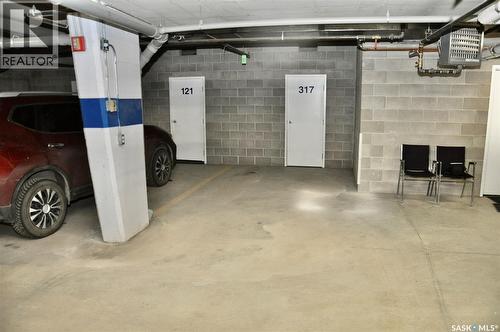 317 325 Keevil Crescent, Saskatoon, SK - Indoor Photo Showing Garage