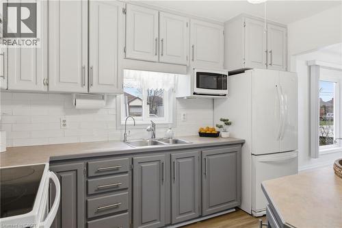 138 Glenholme Avenue, Hamilton, ON - Indoor Photo Showing Kitchen With Double Sink