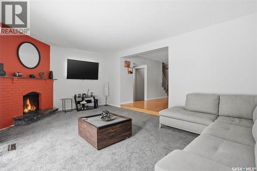 226 Plainsview Drive, Regina, SK - Indoor Photo Showing Living Room With Fireplace