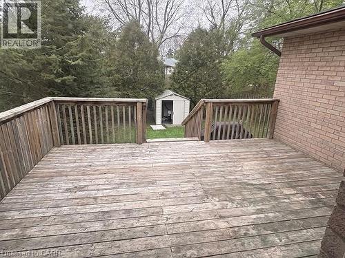 Spacious wood deck with perimeter railing and brick exterior - 70 Bechtel Drive, Kitchener, ON - Outdoor With Deck Patio Veranda With Exterior