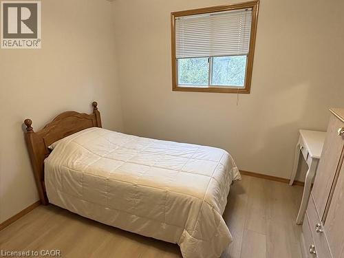 Bright room featuring light-toned walls and wood-finish flooring - 70 Bechtel Drive, Kitchener, ON - Indoor Photo Showing Bedroom