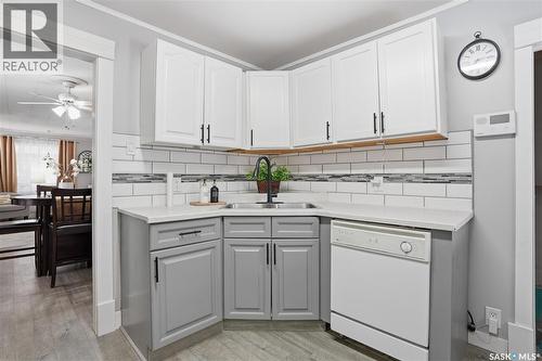 1150 3Rd Avenue Ne, Moose Jaw, SK - Indoor Photo Showing Kitchen With Double Sink