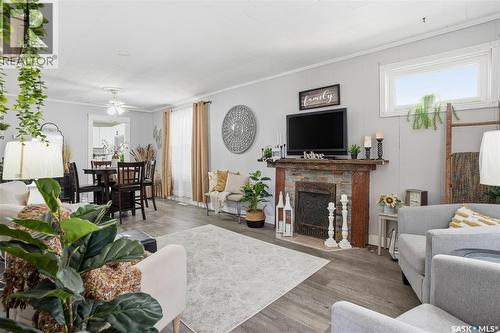 1150 3Rd Avenue Ne, Moose Jaw, SK - Indoor Photo Showing Living Room With Fireplace
