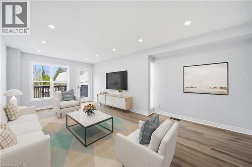 VIRTUALLY STAGED - 233B Vine Street, St. Catharines, ON - Indoor Photo Showing Living Room