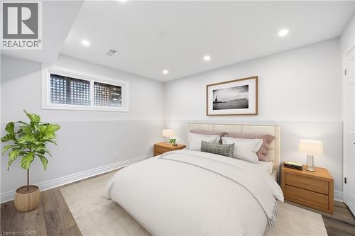 VIRTUALLY STAGED - 233B Vine Street, St. Catharines, ON - Indoor Photo Showing Bedroom