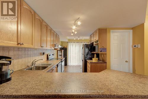 47 - 128 Bonfield Private, Ottawa, ON - Indoor Photo Showing Kitchen With Double Sink