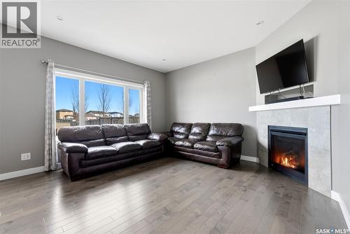5517 Norseman Crescent, Regina, SK - Indoor Photo Showing Living Room With Fireplace
