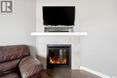 5517 Norseman Crescent, Regina, SK - Indoor Photo Showing Living Room With Fireplace