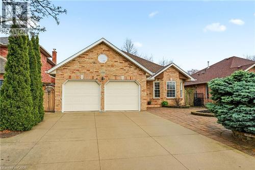 Concrete Driveway & Double Garage. - 1156 Augustus Drive, Burlington, ON - Outdoor With Facade
